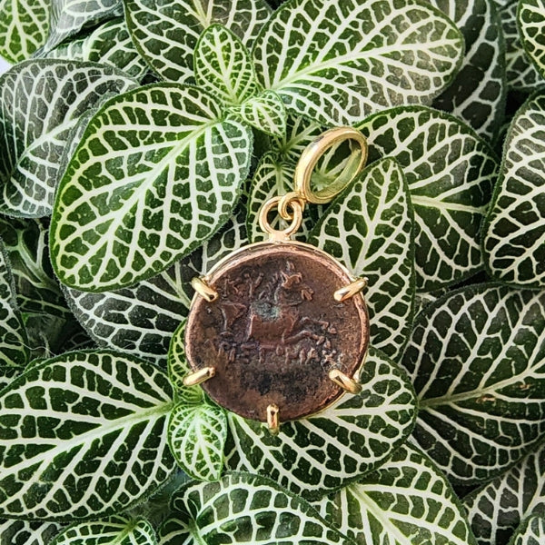 18kt gold pendant with ancient greek bronze coin of a horse