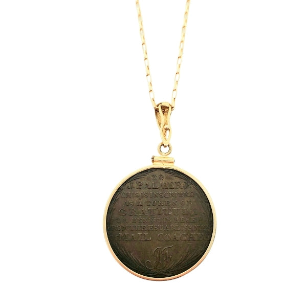 Back of Mailcoach conder token J. Palmeri showing removable gold bail