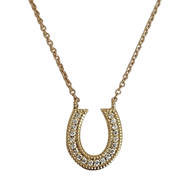 Horseshoe necklace accented with diamonds and milgrain detail.  14kt gold.