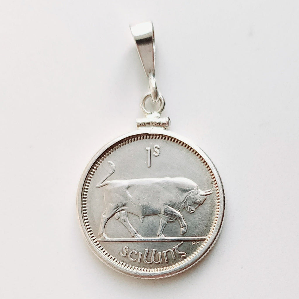 Irish 1 shilling coin of a bull set in a sterling silver coin mount