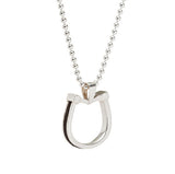 Medium horseshoe pendant with horsehair braid