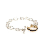 Gold horseshoe toggle bracelet with inset horsehair braid
