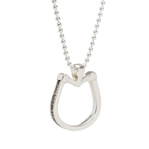 Horseshoe pendant with blackened silver bead inset